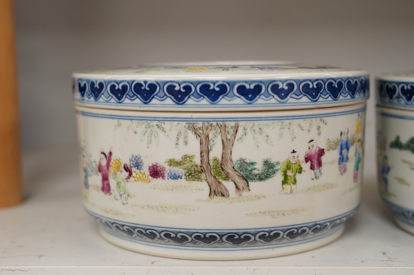 A pair of 20th century Chinese famille rose erotic powder boxes, 19cm diameter. Condition - good